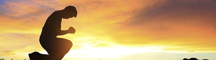 Praying at sunrise
